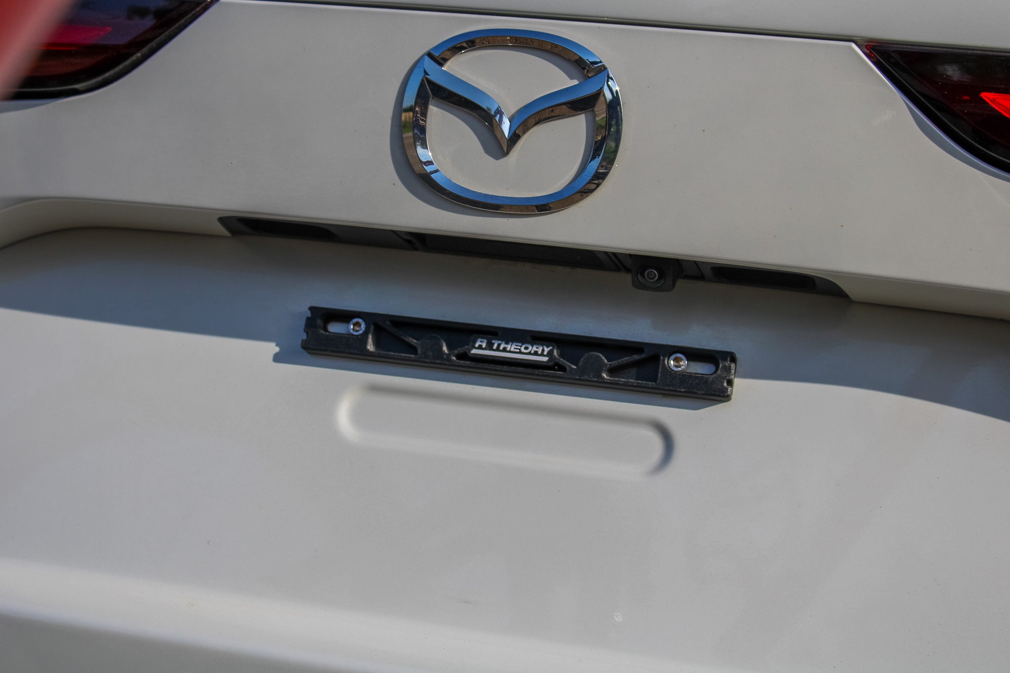 Universal License Plate Quick Release - Carbon Reinforced Plastic